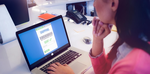 Screenshot of a specialized tax payment platform on a laptop screen, highlighting features like IPTU barcode retrieval and online payment options. The interface is clean and user-friendly.