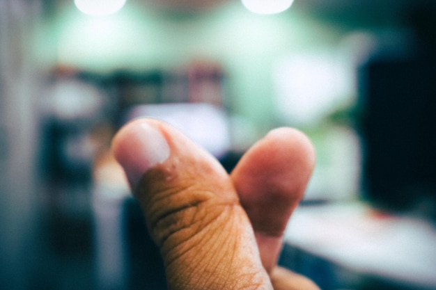 Close-up snapshot of a voter's finger being scanned on a biometric device during voter registration in Brazil, highlighting the technology and process.