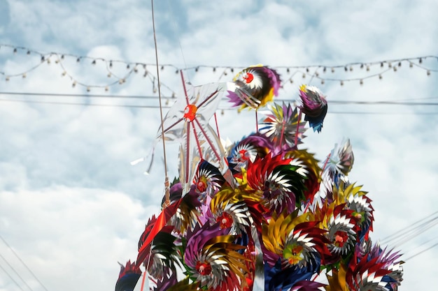 A photograph of a vibrant Carnival parade in Rio de Janeiro, Brazil, filled with colorful floats, dancers in elaborate costumes, and a lively crowd cheering along the streets.
