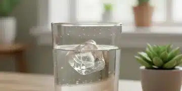 Water Conservation at Home: Save Gallons With These 5 Easy Fixes Fresh glass of water on wooden table, symbolizing water conservation