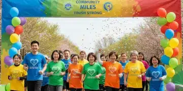 Group of diverse participants running and walking in a charity event in spring, smiling and celebrating at the finish line.