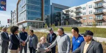 Veterans smiling with housing and healthcare facilities in background